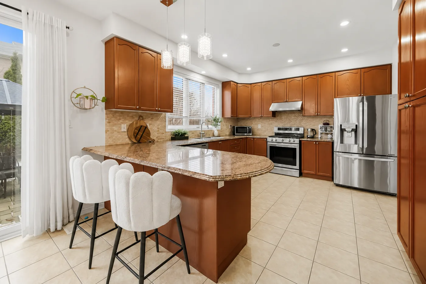 Warm maple kitchen before a countertop update
